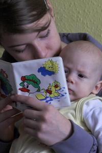 mother and baby reading
